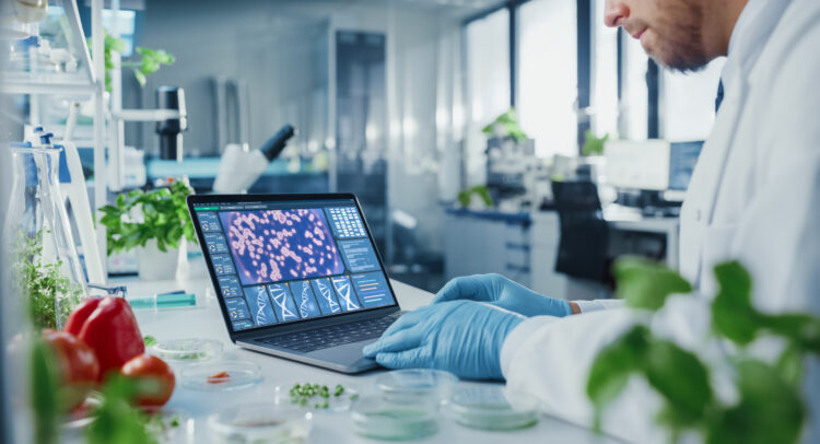 Laboratory test tubes with green liquid